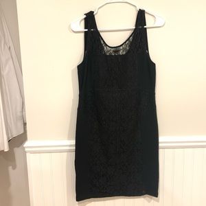 A lightly worn black dress